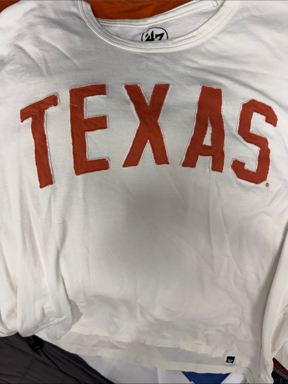 47 White Crewneck Sweatshirt with Orange TEXAS Appliqué